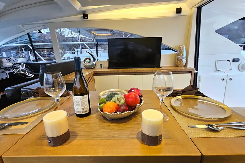 Magic Carpet Yacht Photos Pics Elegant dining and Pop up TV for Entertainment