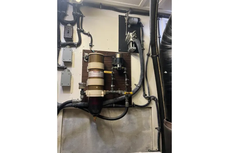 Long Tail Yacht Photos Pics Engine room of 1985 Hatteras 58 Motor Yacht with fuel filtration system.