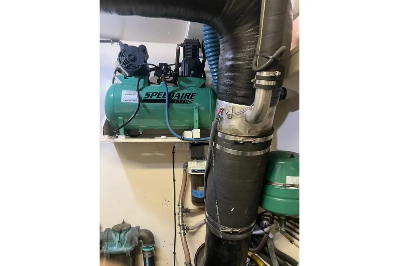 Long Tail Yacht Photos Pics Engine room of 1985 Hatteras 58 Motor Yacht with Speedaire compressor.