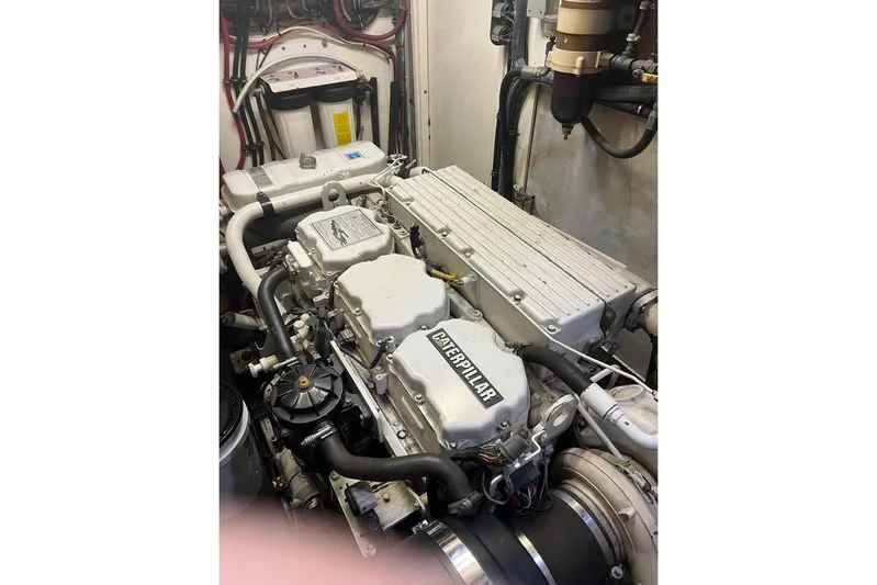 Long Tail Yacht Photos Pics Engine room of 1985 Hatteras 58 Motor Yacht with Caterpillar engine.