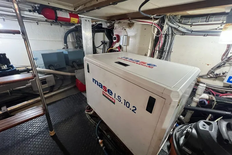 Long Tail Yacht Photos Pics Engine room of 1985 Hatteras 58 Motor Yacht with Mase Yanmar generator.