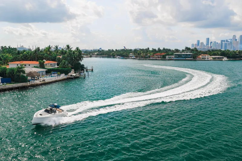 The Wolf Yacht Photos Pics 2021 Pardo Yachts 38 cruising in a scenic coastal waterway.