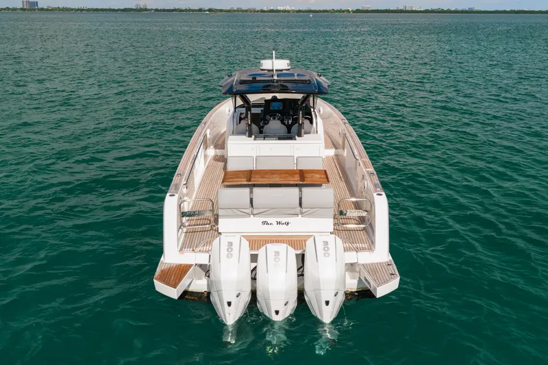 The Wolf Yacht Photos Pics 2021 Pardo Yachts 38 on water, rear view with triple outboard engines.