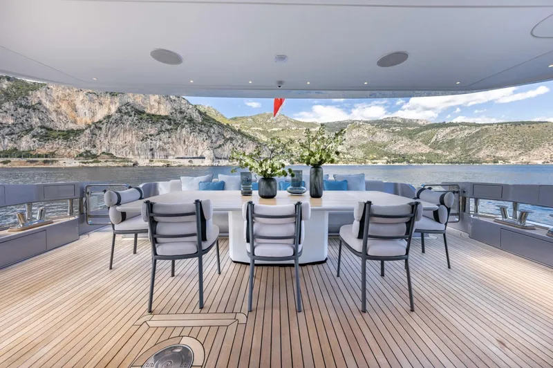 Ocean One Yacht Photos Pics Luxurious deck of 2023 Azimut Grande 36M yacht with scenic mountain view.