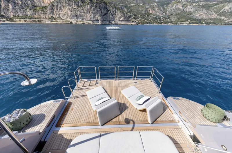 Ocean One Yacht Photos Pics Luxury Azimut Grande 36M yacht deck with sun loungers, 2023 model, scenic ocean view.