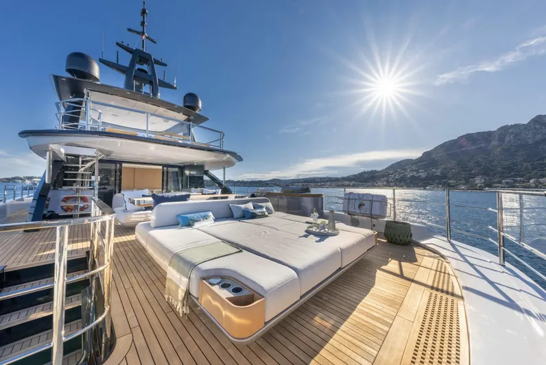 Ocean One Yacht Photos Pics Luxurious 2023 Azimut Grande 36M yacht deck with sun loungers and ocean view.