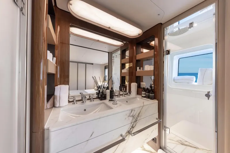 Ocean One Yacht Photos Pics Luxurious bathroom in 2023 Azimut Grande 36M yacht with dual sinks and elegant design.