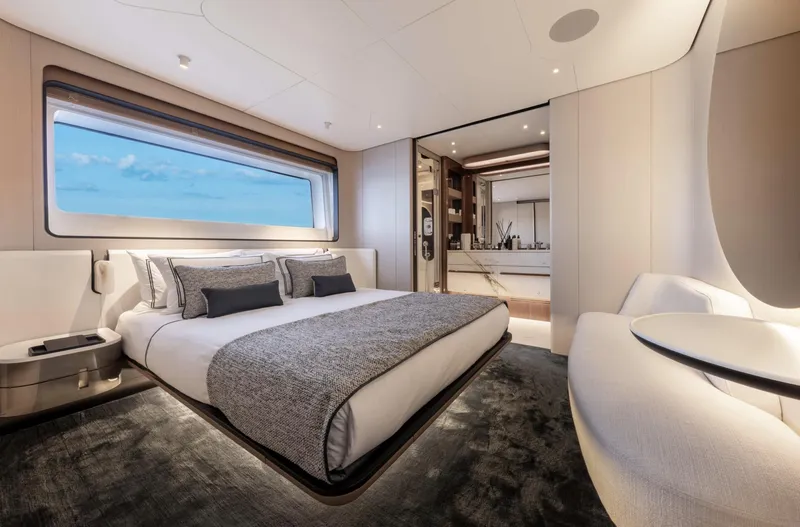 Ocean One Yacht Photos Pics Luxurious bedroom interior of 2023 Azimut Grande 36M yacht with modern design and ocean view.