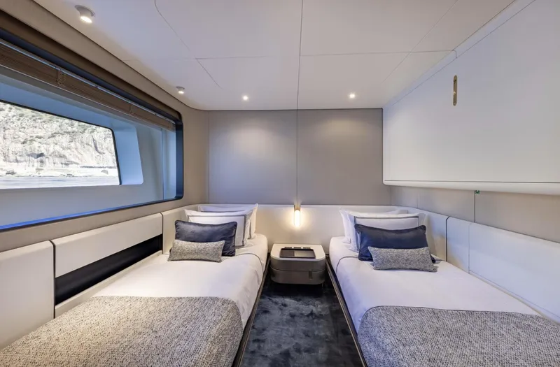 Ocean One Yacht Photos Pics Luxurious twin bedroom on 2023 Azimut Grande 36M yacht, featuring modern design and ocean view.
