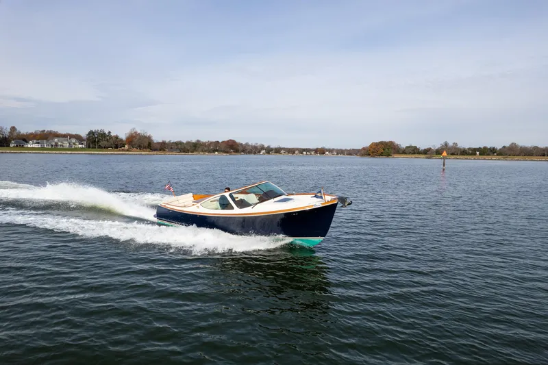 Ballymena Yacht Photos Pics 2006 Hinckley Talaria 29 R cruising on a calm lake.