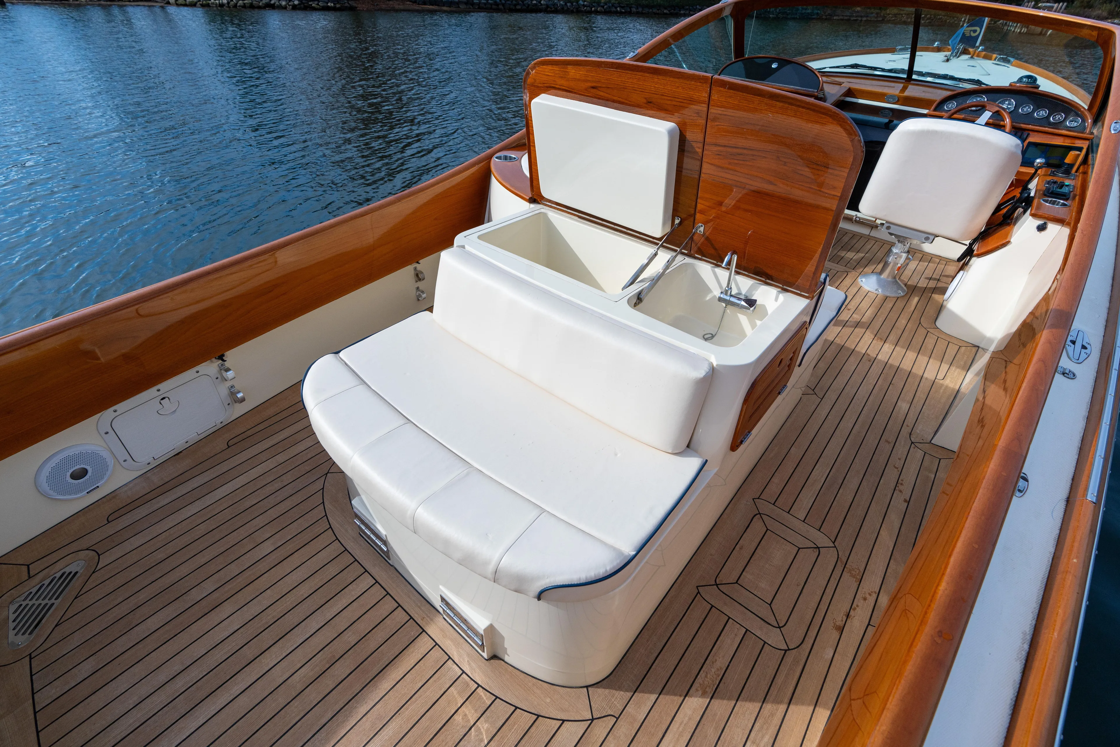 Ballymena Yacht Photos Pics 2006 Hinckley Talaria 29 R boat interior with elegant wood and white seating.