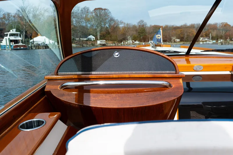 Ballymena Yacht Photos Pics 2006 Hinckley Talaria 29 R boat interior with polished wood and scenic water view.