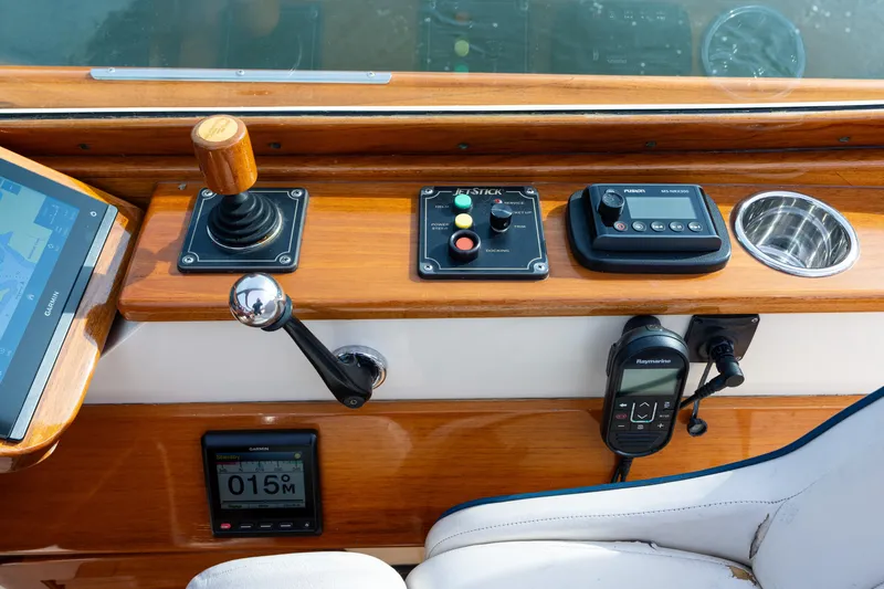 Ballymena Yacht Photos Pics 2006 Hinckley Talaria 29 R helm with joystick, controls, and navigation equipment.