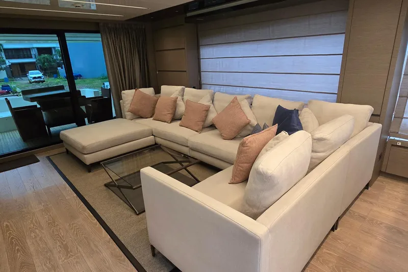  Yacht Photos Pics Luxurious interior of 2021 Sanlorenzo SL78 yacht with elegant beige sectional sofa.