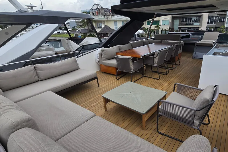  Yacht Photos Pics Luxurious 2021 Sanlorenzo SL78 yacht deck with elegant seating and dining area.