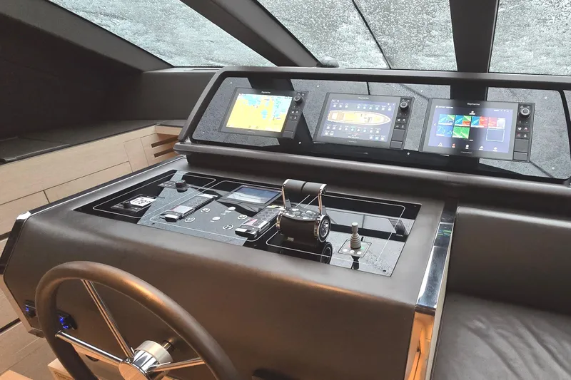  Yacht Photos Pics Helm of 2021 Sanlorenzo SL78 yacht with advanced navigation displays and controls.