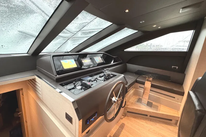  Yacht Photos Pics Modern helm station of 2021 Sanlorenzo SL78 yacht with advanced navigation systems.