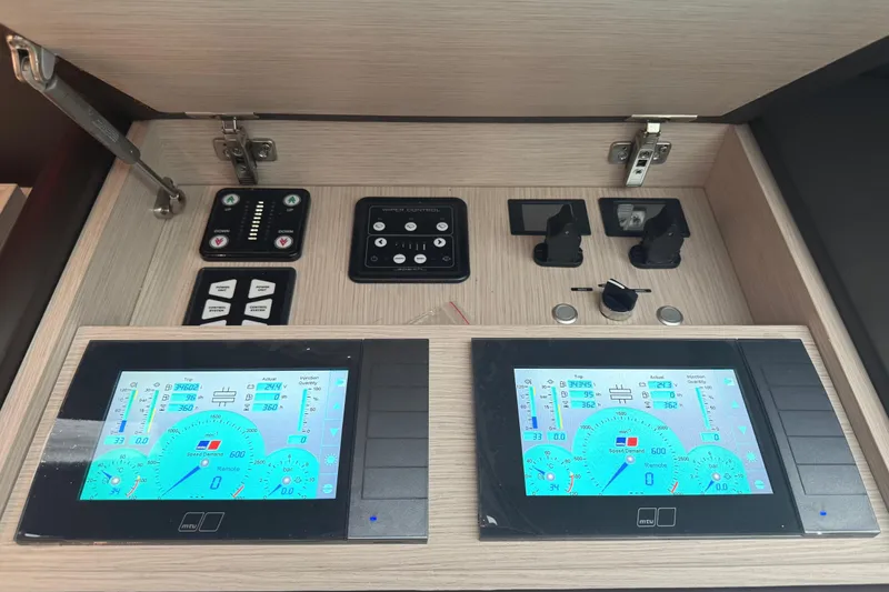  Yacht Photos Pics Control panel of 2021 Sanlorenzo SL78 yacht with digital displays and switches.