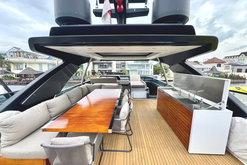  Yacht Photos Pics Luxurious 2021 Sanlorenzo SL78 yacht deck with dining area and outdoor kitchen.