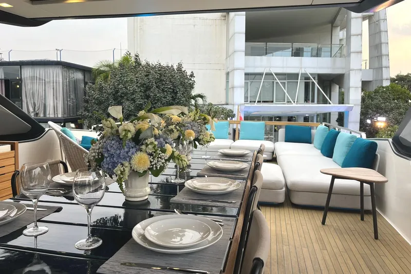  Yacht Photos Pics Luxurious 2021 Sanlorenzo SL78 yacht deck with elegant dining setup and plush seating.