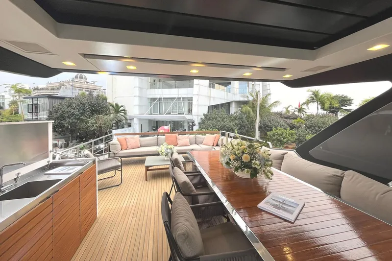  Yacht Photos Pics Luxurious 2021 Sanlorenzo SL78 yacht deck with elegant seating and dining area.