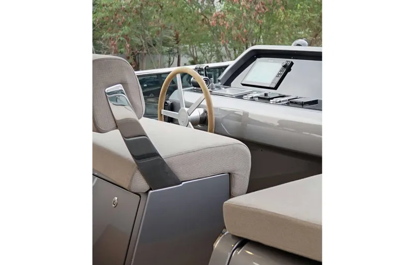  Yacht Photos Pics Luxurious helm of 2021 Sanlorenzo SL78 yacht with modern controls and plush seating.