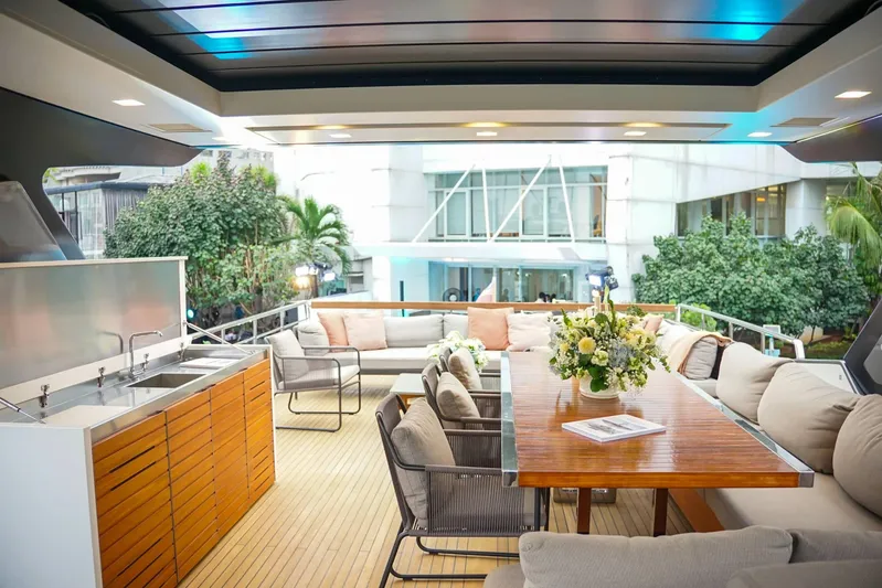  Yacht Photos Pics Luxurious 2021 Sanlorenzo SL78 yacht deck with elegant seating and dining area.