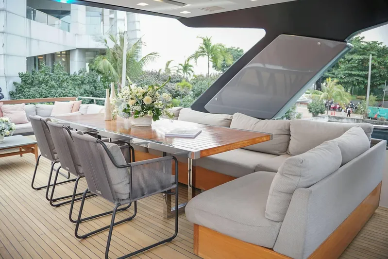  Yacht Photos Pics Luxurious 2021 Sanlorenzo SL78 yacht deck with elegant dining area and plush seating.