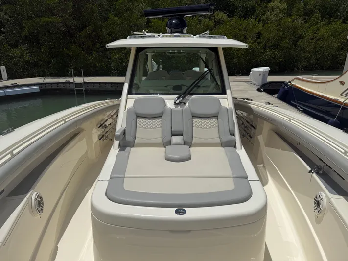  Yacht Photos Pics 2022 Scout 425 LXF boat with luxurious seating and sleek design.