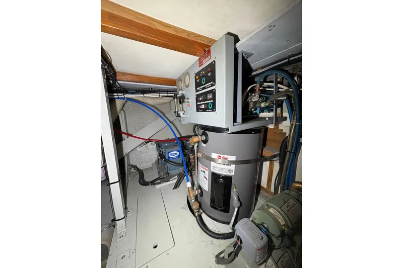 Sea Legs Yacht Photos Pics Engine room of a 1987 Bertram 46.6 yacht with mechanical equipment.