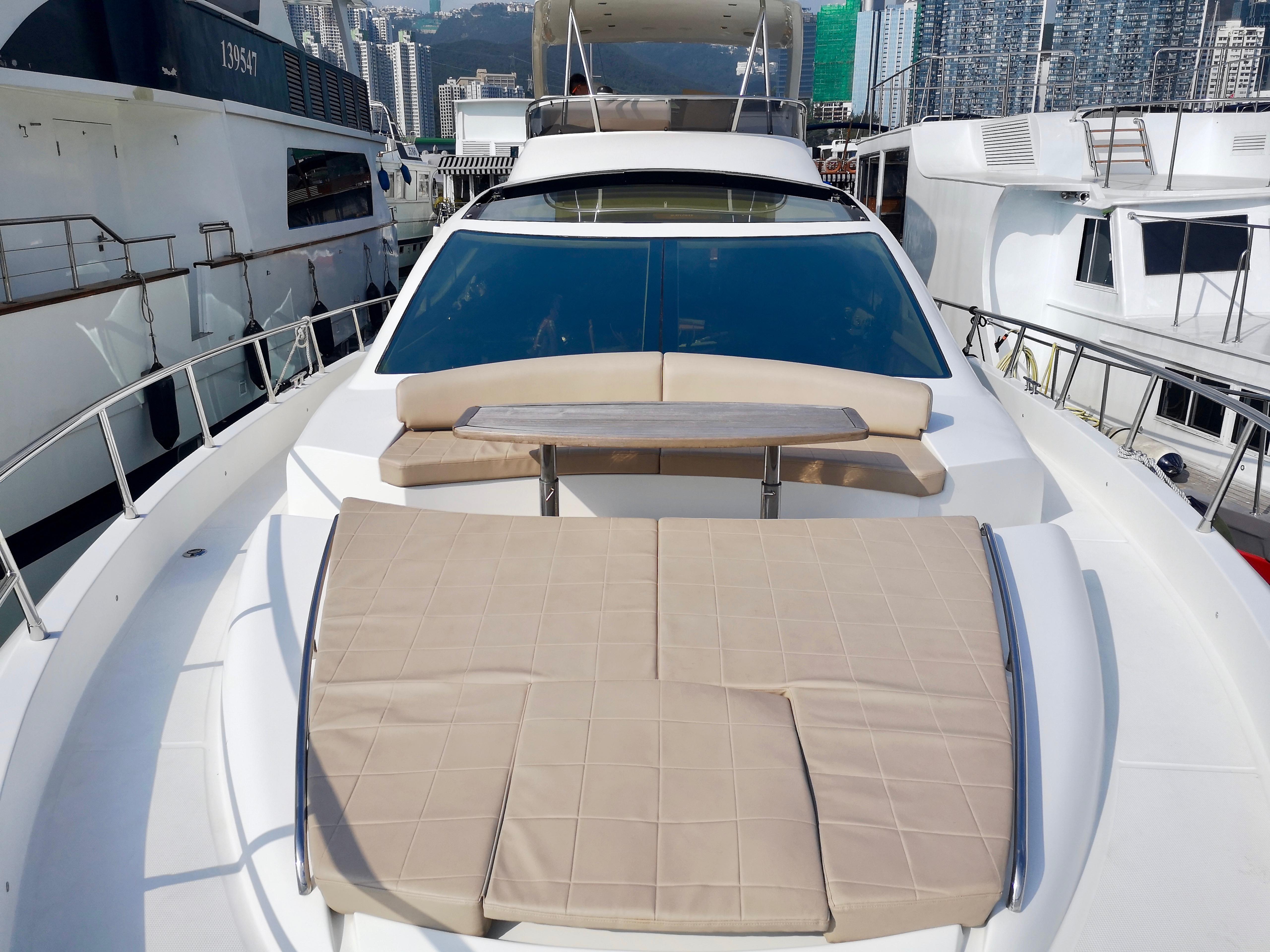 Luxurious 2012 Ruby 65s yacht with spacious sun deck and modern design.