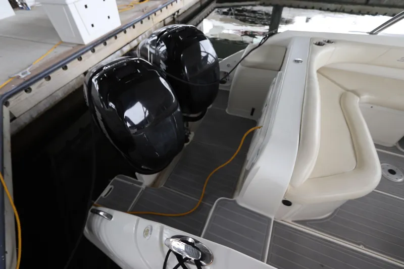  Yacht Photos Pics 2014 Intermarine 380 Sport boat with dual outboard motors docked.