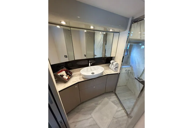 48 Navetta Yacht Photos Pics Luxurious bathroom in 2019 Absolute NAVETTA 48 yacht with modern fixtures and elegant design.