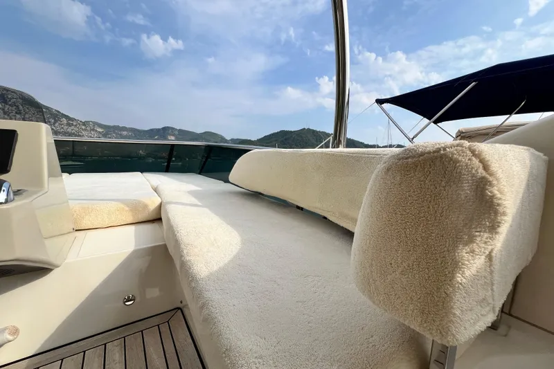 48 Navetta Yacht Photos Pics Luxurious 2019 Absolute NAVETTA 48 yacht interior with plush seating and scenic views.