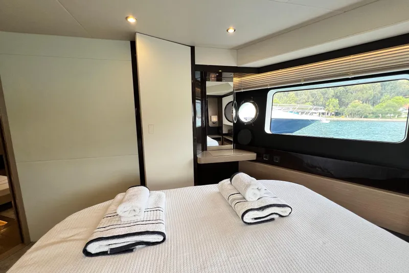 48 Navetta Yacht Photos Pics Luxurious interior of 2019 Absolute NAVETTA 48 yacht with scenic window view.