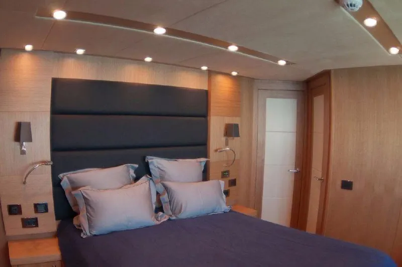 Melissa Yacht Photos Pics Luxurious bedroom interior of 2011 Sunseeker 34 Metre Yacht with modern lighting.