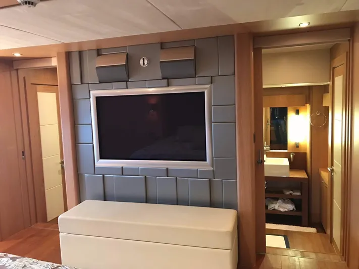 Melissa Yacht Photos Pics Luxurious interior of 2011 Sunseeker 34 Metre Yacht with modern TV and ensuite bathroom.