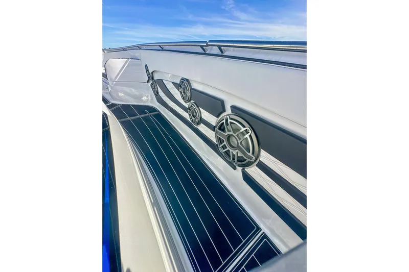  Yacht Photos Pics 2024 MTI V42 boat interior with sleek design and modern speaker system.