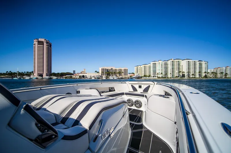  Yacht Photos Pics 2024 MTI V42 luxury boat interior with city skyline and waterfront view.
