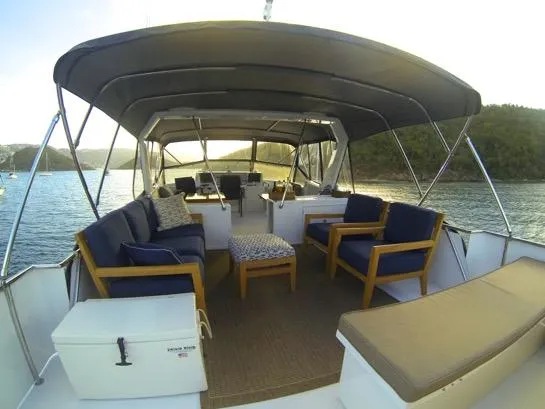 Mcgregor III Yacht Photos Pics Spacious deck of 2001 Jefferson Marquessa 60 MY yacht with comfortable seating and scenic views.