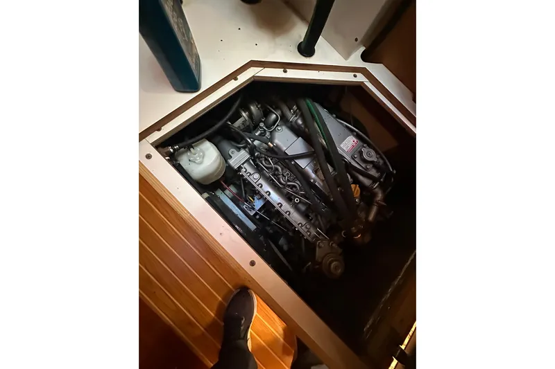 True North Yacht Photos Pics Engine compartment of a 2003 Catalina 470 sailboat, showing detailed mechanical components.