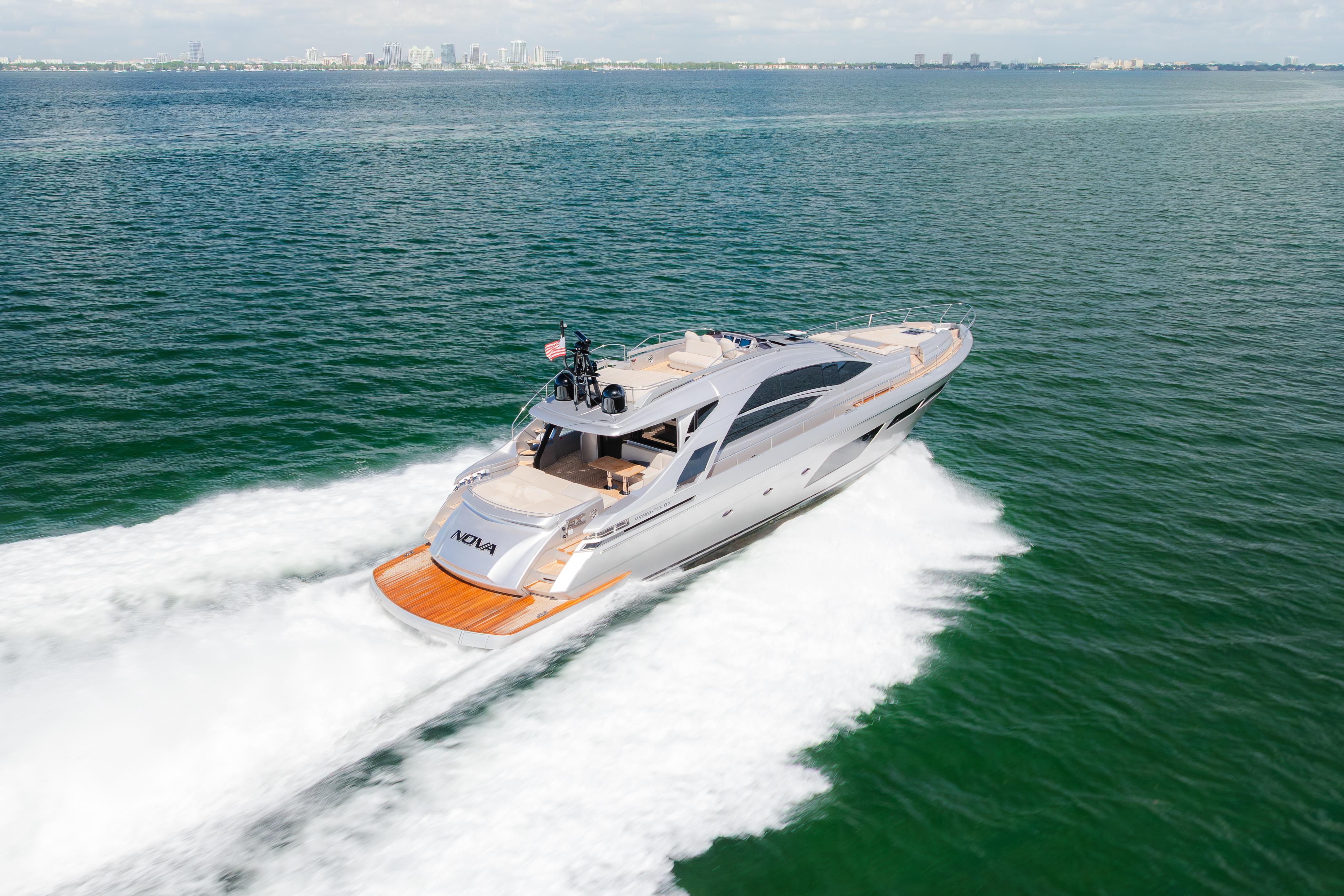 Luxury Pershing 8X yacht cruising on open water, 2021 model, sleek design.