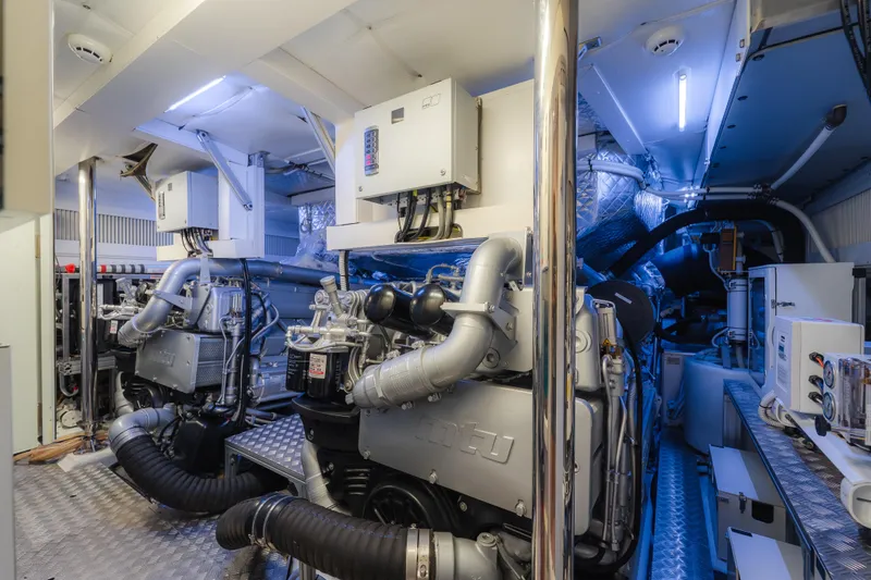Nova Yacht Photos Pics Engine room of a 2021 Pershing 8X yacht, featuring advanced machinery and equipment.