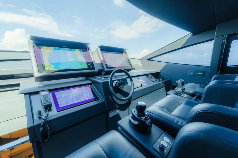 Nova Yacht Photos Pics Cockpit of 2021 Pershing 8X yacht with advanced navigation systems and luxurious seating.