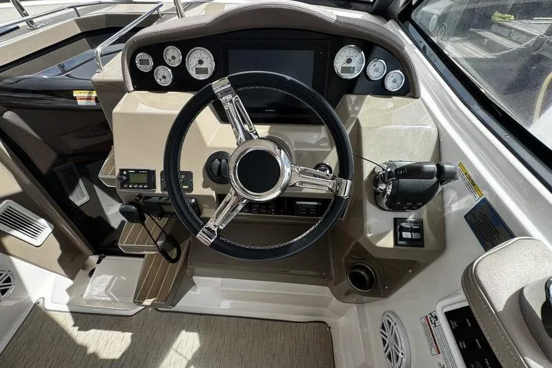  Yacht Photos Pics 2018 Regal 35 Sport Coupe helm with modern controls and steering wheel.