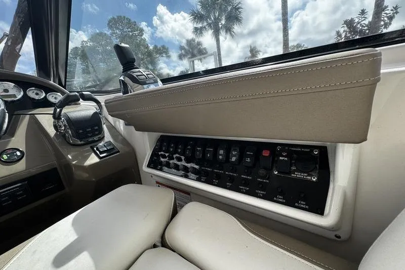  Yacht Photos Pics 2018 Regal 35 Sport Coupe dashboard with control panel and steering wheel.