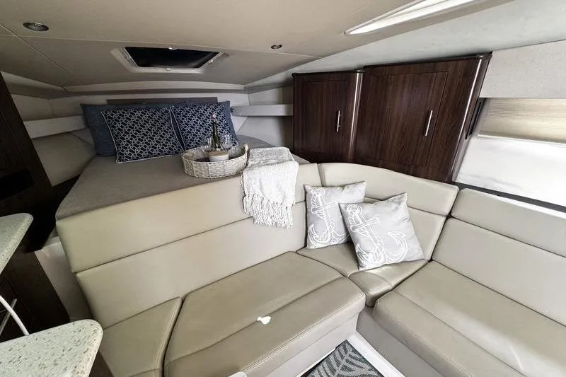  Yacht Photos Pics Interior of 2018 Regal 35 Sport Coupe with cozy seating and elegant decor.
