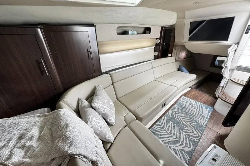  Yacht Photos Pics Luxurious interior of 2018 Regal 35 Sport Coupe with modern seating and decor.