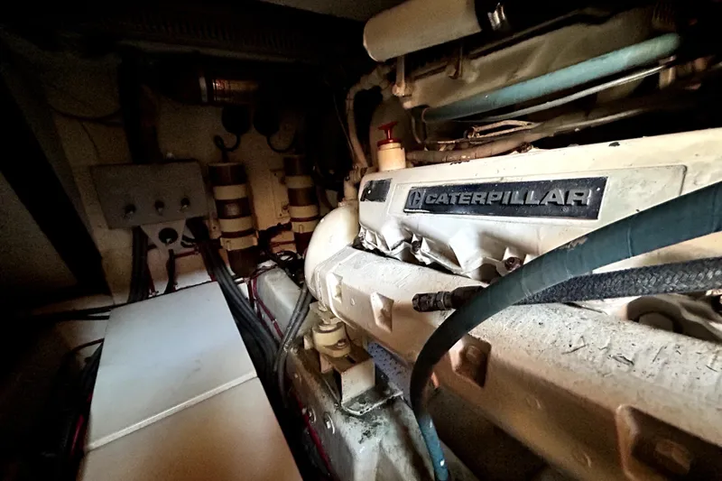 Chrysalis Yacht Photos Pics Engine room of 1989 Ocean Alexander 44 CPMY with Caterpillar engine.