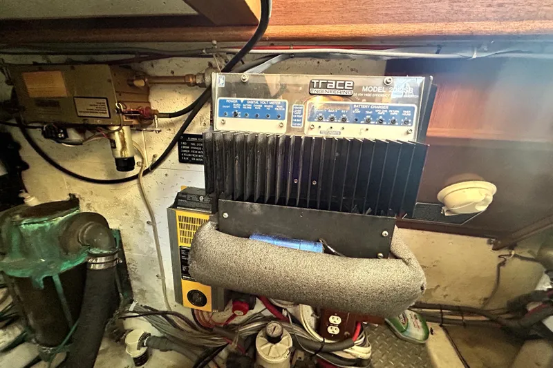 Chrysalis Yacht Photos Pics Electrical system components in a 1989 Ocean Alexander 44 CPMY yacht engine room.